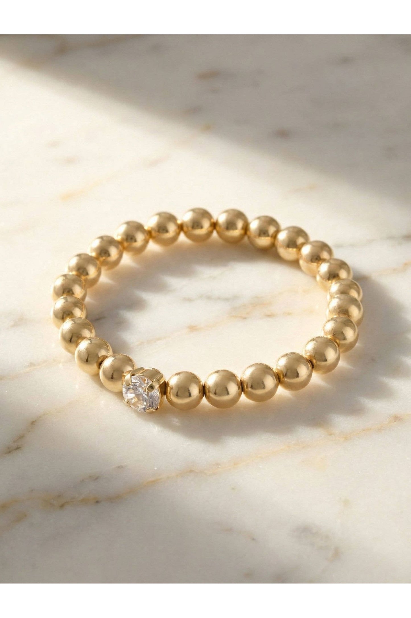 Clear Crystal & 10K Gold Plated Beaded Stretch Bracelet 7in