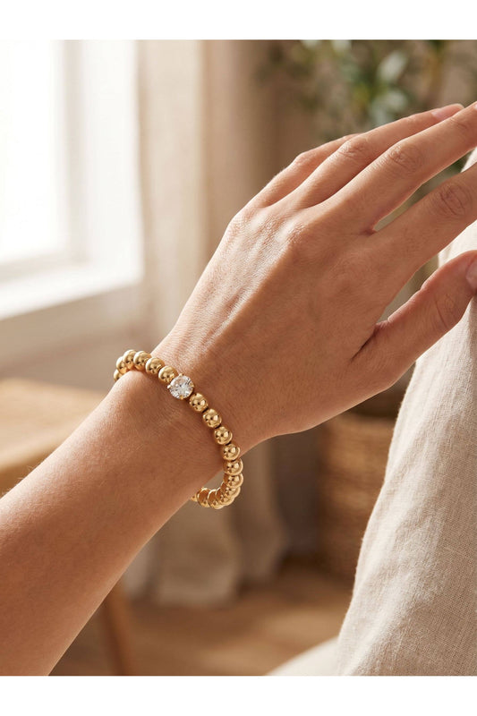 Clear Crystal & 10K Gold Plated Beaded Stretch Bracelet 7in