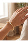 Clear Crystal & 10K Gold Plated Beaded Stretch Bracelet 7in